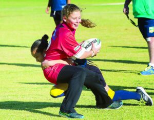 Girls tackle the game head-on