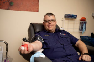 Firefighters roll up to let the blood flow