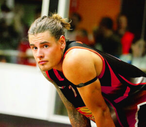 Symons signs off with win